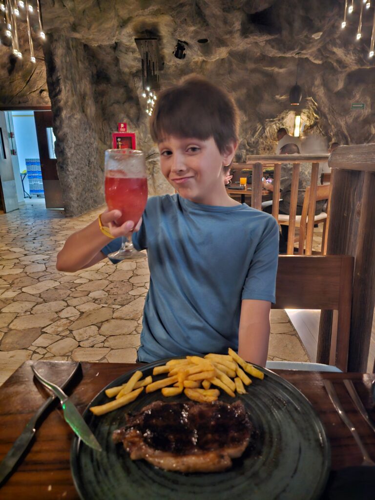 At The Cave Restaurant he ordered steak and fries!